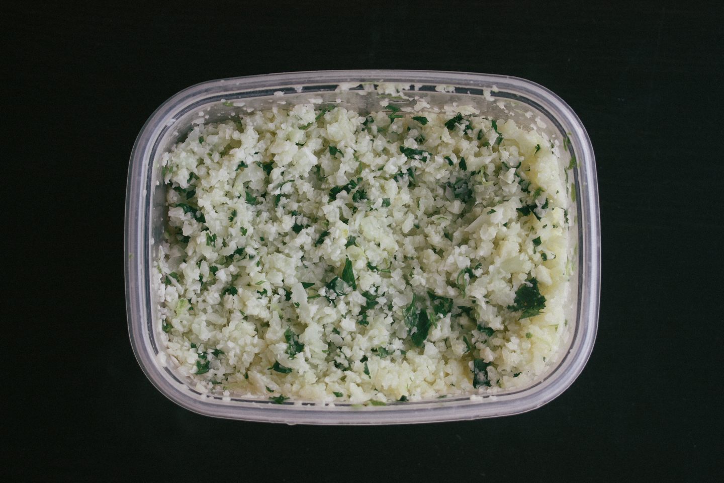 Chipotle Style Cilantro-Lime Cauliflower Rice after microwave and ingredients mixed in