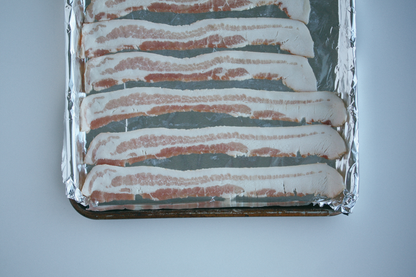 Load up the bacon on a foil lined baking sheet